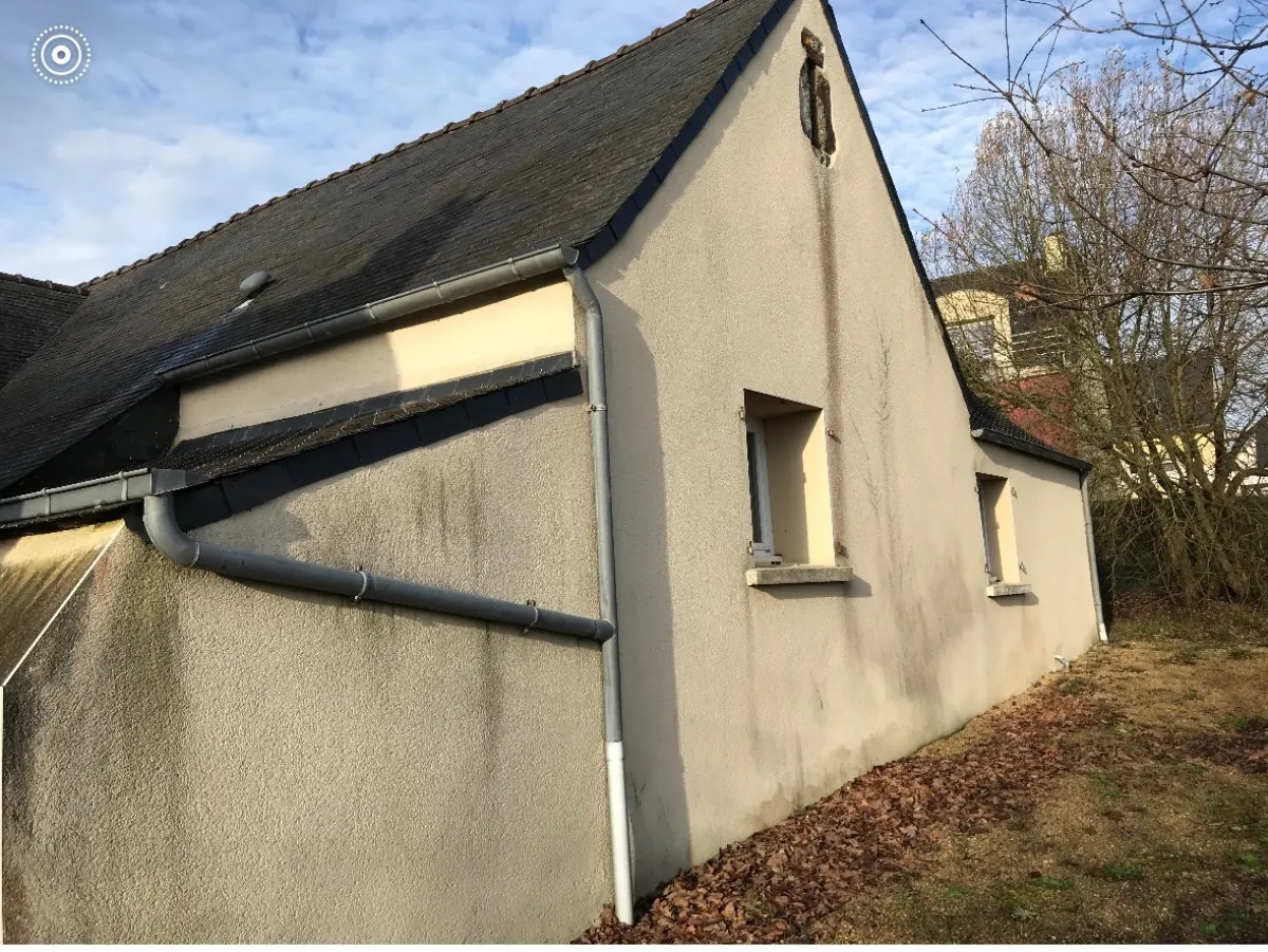 Pignon avec gouttiere zinc posee par Zimmermann